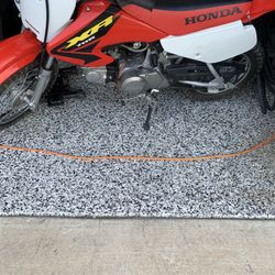2003  XR70