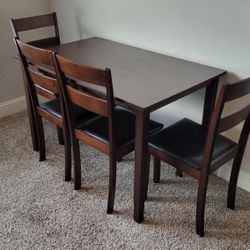 Set Of Small Dark Brown Dining Table With 4 Cushioned Chairs