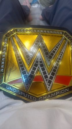 mini wwe championship belt signed by Cody Rhodes