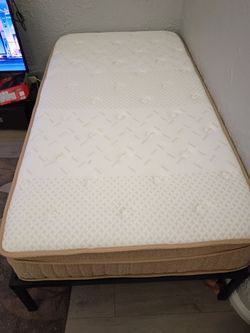 Twin medium-firm mattress + steel bed frame