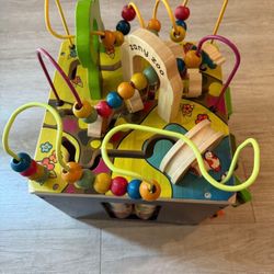 This is the B. toys Zany Zoo wooden activity cube. 