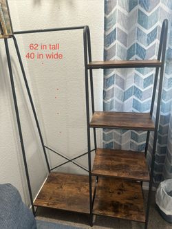 Clothing rack with decorative shelf