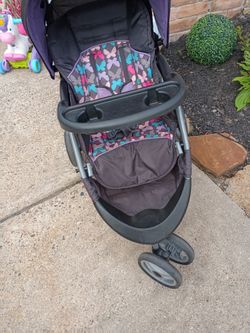 Little faded stroller from being in the garage sale asking 20