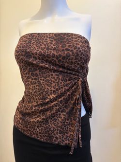 Cheetah top worn once size small $10 Black skirt with shorts inside size small worn once $10