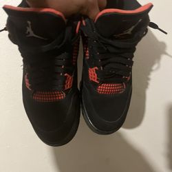 Red Thunder Jordan 4s