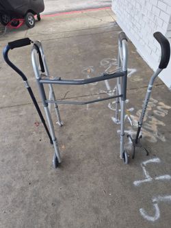 New 2 button folding  walker  and 2 canes