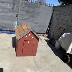 Small dog house on  wheels