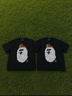 Bape shirt, money never sleeps shirt, cookie shirt, and rich no risk shirt.