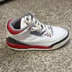 Red and white Jordan 3s
