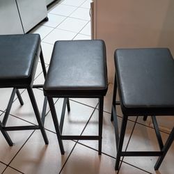 Set of three steel and leather stools from Amazon