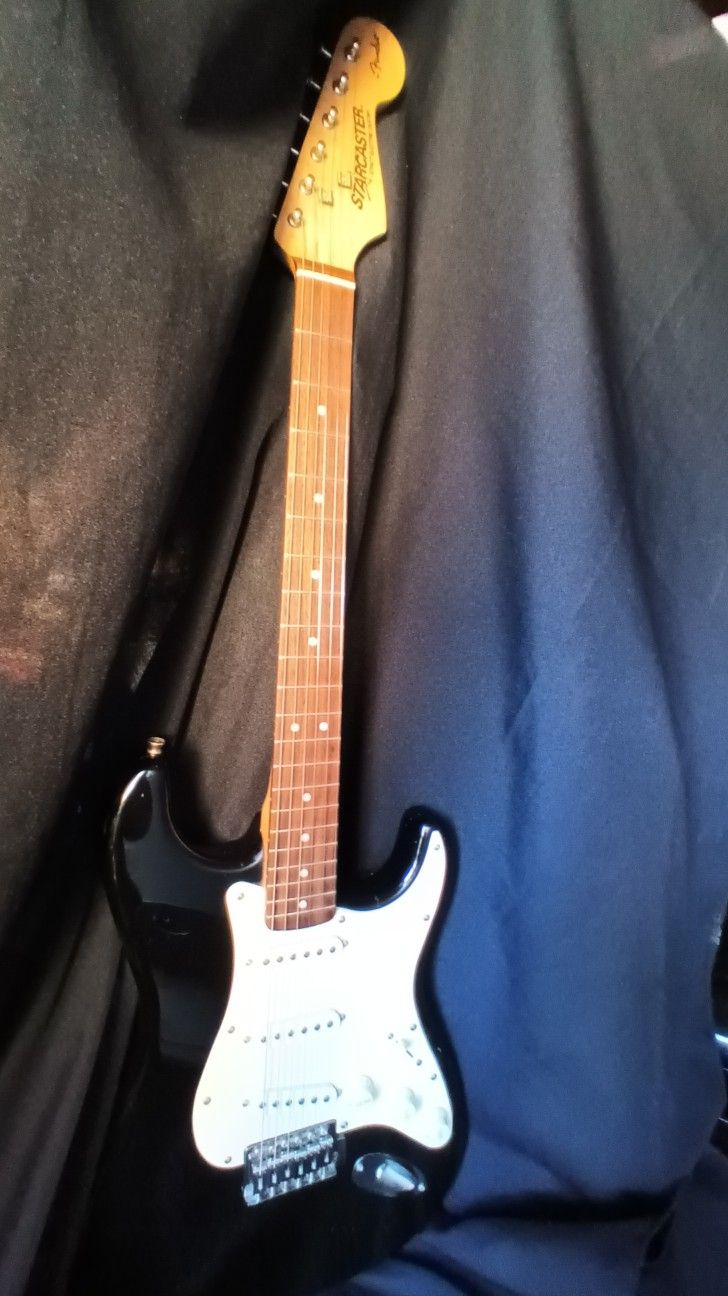 Starcaster Guitar &Fender Practice Amp.
