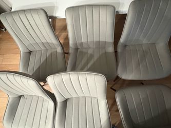 Six grey dinning chairs