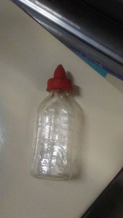 Vintage glass toy baby bottle