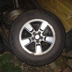 235/70/r16 Jeep commander wheel/spare $150/bestoffer or trade