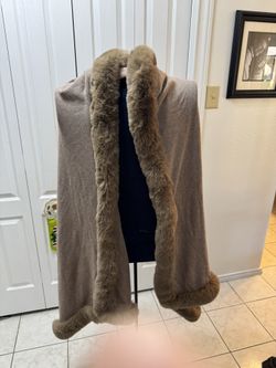 Exclusive Oatmeal Fiorentina faux fur color wrap. 