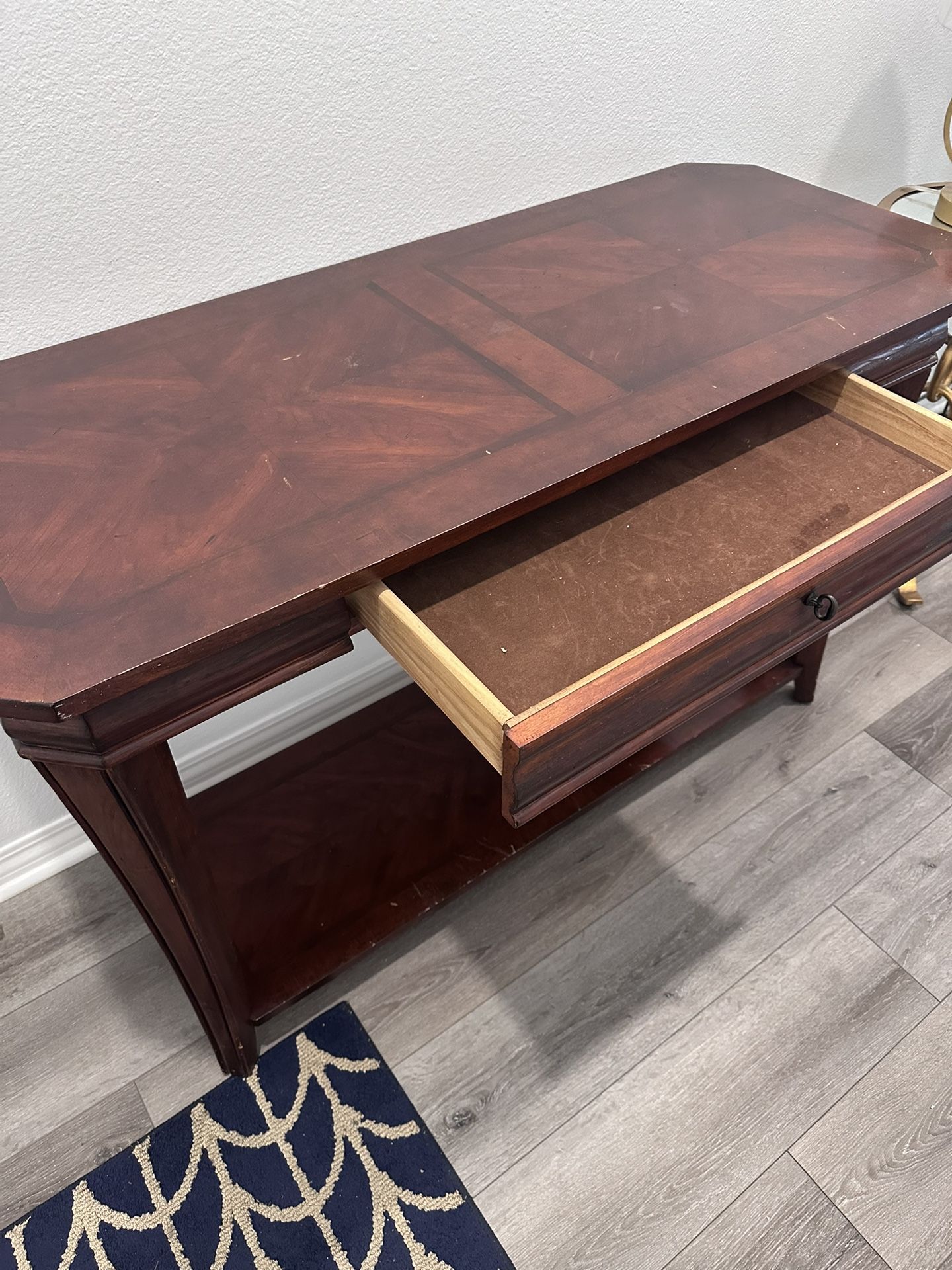 Back Of Couch Table And Gold Round Table