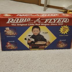 NEW Radio Flyer Sled.
