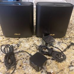 Two ASUS XT 8 Mesh Routers