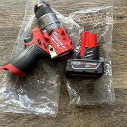 Milwaukee M12 FUEL 12V Lithium-Ion Brushless Cordless 1/2 in.hammer Drill Driver with one battery 4.0ah Price is firm $120