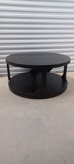 CLASSY ROUND RUSTIC COCKTAIL TABLE rolls On Casters