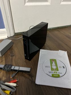 Nintendo Wii Console Black with Wii Fit Plus and working condition just missing the remotes