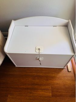White wooden toy chest