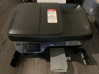 A HP printer with 2 new Cartridges