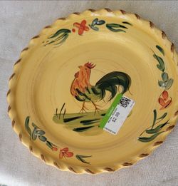 Dinner and smaller rooster plates . 10 of each
