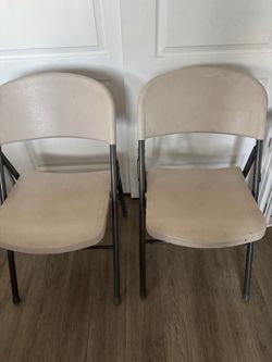 2 folding chairs $20