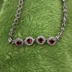 :  Elegant Ruby and Diamond-Inspired Bracelet - Perfect Gift for Any Occasion  Description:  This luxurious bracelet features a modern and delica