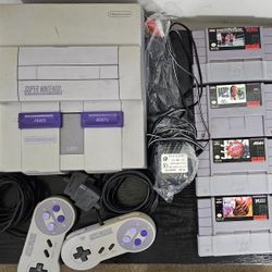 Super Nintendo System With 8 Games