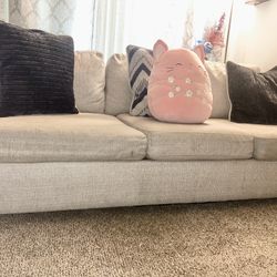 I am selling a semi-new beige living room
