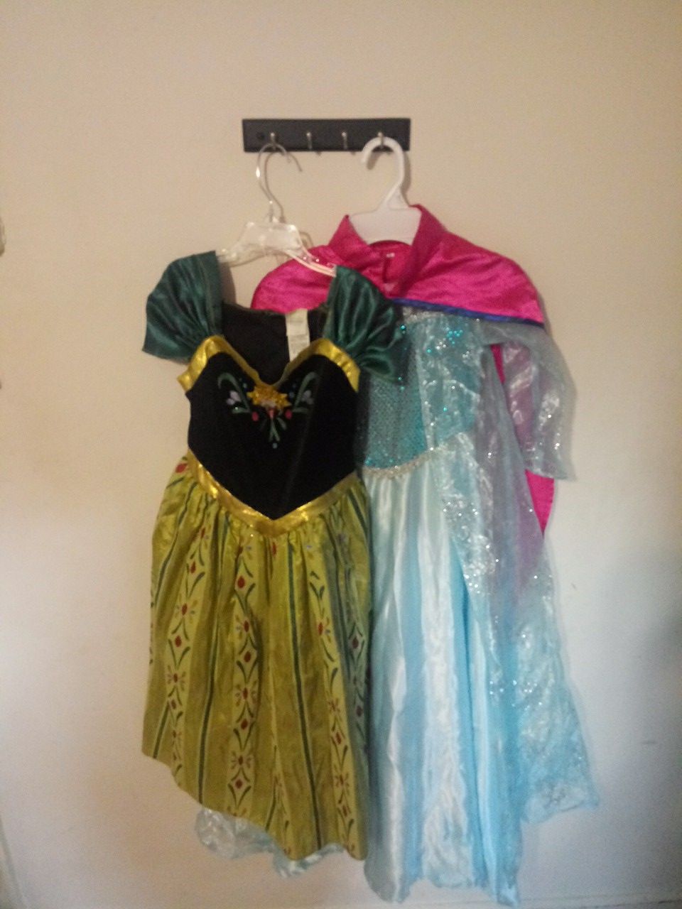 Disney Anna (size 7/8) and homemade Elsa dress Each $10 a