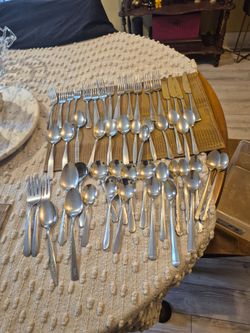 52 piece all are stainless  steel assorted flatware set