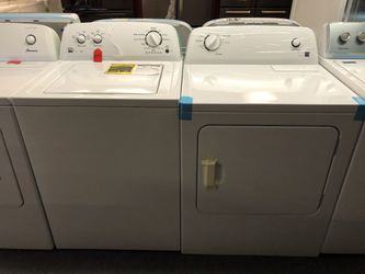 New scratch and dent Kenmore High Efficiency washer and dryer set. 1 year warranty