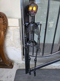 Posable Halloween Skeleton with lighted up eyes