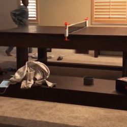 8 Foot pool Table With Table Tops And Benches That Open Up With Storage For Sticks And Balls