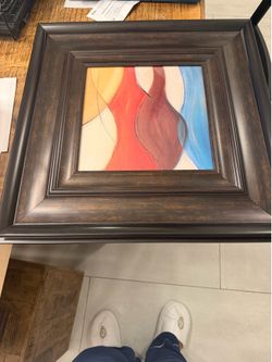 Abstract print with wood frame.