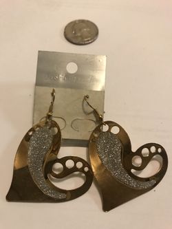Gold tone heart earrings with silver glitter accent