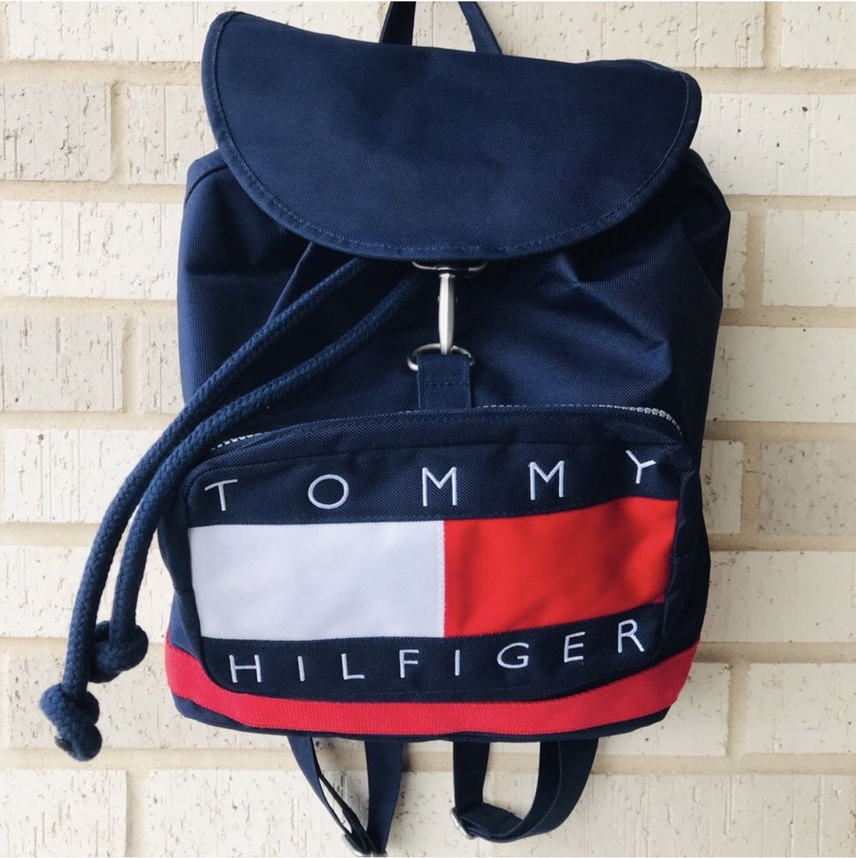 Tommy Hilfiger spell out logo drawstring clasp backpack