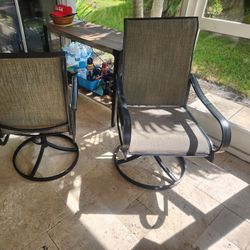 2 High Back Swivel Rockers  40 In High