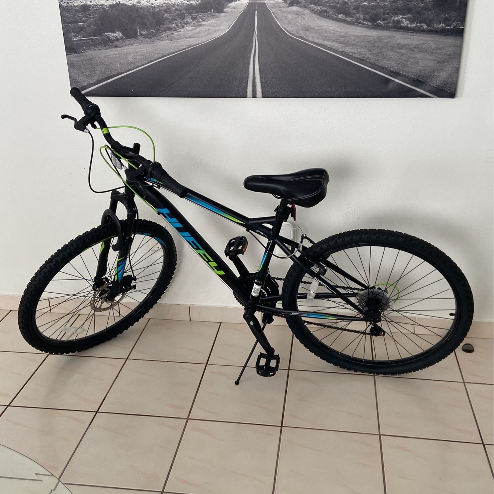 Huffy bike in Black With Neon  Green And Blue Accents