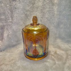 Vintage Carnival glass grapes marigold iridescent container with lid.