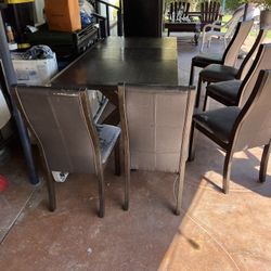 Table And 4 Chairs