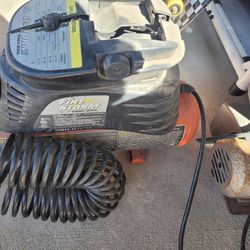 Small Air Compressor And A Skill Saw