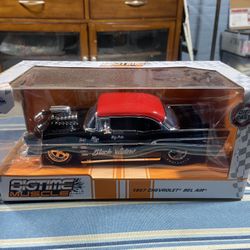 ) Diecast 1957 Chevrolet Bel Air Black with Red Top "Pete's Auto Body: Black Widow" "Bigtime Muscle" Series 1/24 Diecast Model Car by Jada