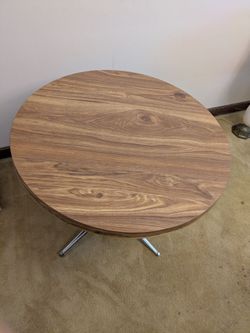 Round Table With Chrome Base.  36" round x 28" height.