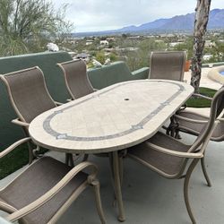 7 Foot Tiled Concrete Patio Table and 6 Chairs