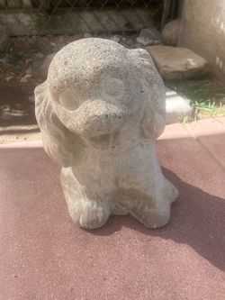 Cement dog garden statue