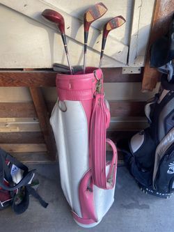 Woman’s leather gulf bag and clubs